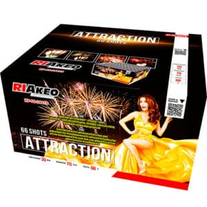 Packaging for a 66-shot fireworks display cake labeled ATTRACTION, featuring a woman in a yellow dress posing beside fireworks graphics.